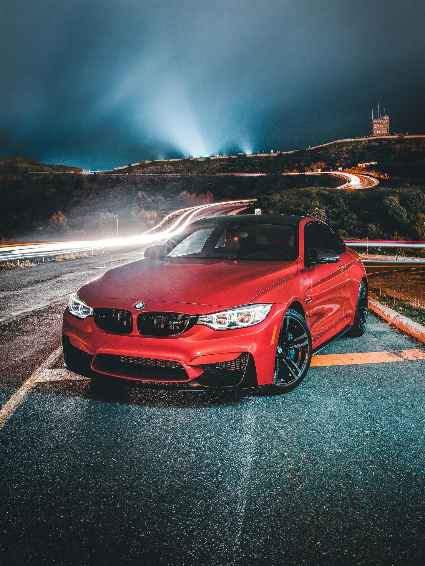 Enclosed transport hauling a white supercar